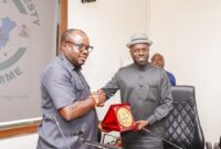 The Administrator of the Presidential Amnesty Programme, Dr Dennis Otuaro (l), presenting a plaque to the President of the Ijaw Youth Council, Jonathan Lokpobiri (r), during a courtesy visit by the IYC to the PAP Office in Abuja on Monday, October 21, 2024.