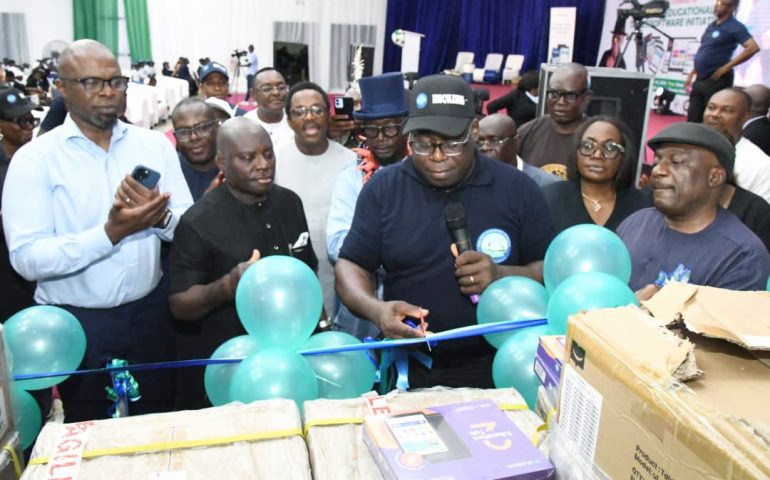 NDDC Director of Education, Health, and Social Services, Dr. George Uzonwanne unveiling the educational tablets. 