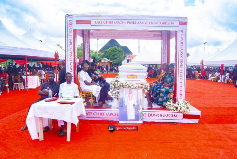 The casket surrounded by the late Chief Azaiye first son and family