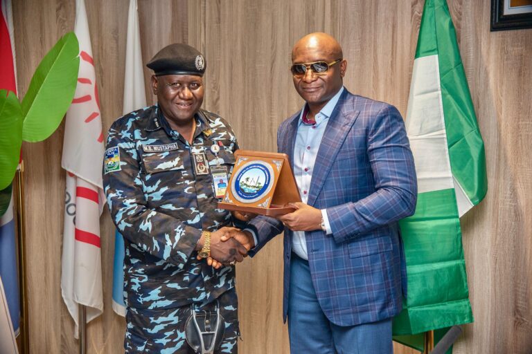 The NDDC Managing Director, Dr. Samuel Ogbuku (right), presenting a plaque to the River State Commissioner of Police, Mr. Mustapha Mohammed (left), during a courtesy visit, at the Commission headquarters in Port Harcourt.