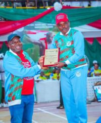 Diri presenting a plaque to Adewale Adeniyi, the Comptroller General of Customs during the event