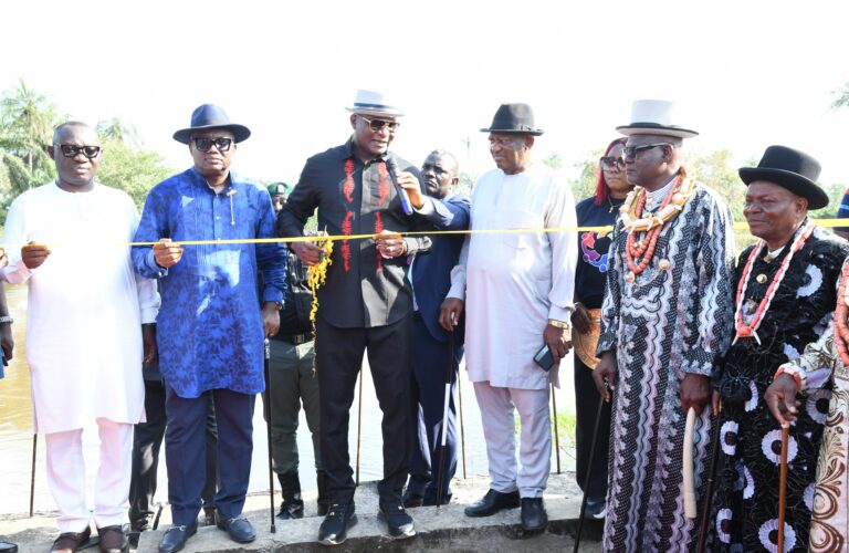 1. The NDDC Managing Director, Dr. Samuel Ogbuku (middle) cutting the tap to flag-off channelisation of the Kolo Creek at Okarki, Ahoada West LGA, Rivers State, supported by the NDDC Executive Director Projects, Sir Victor Antai (2nd left); the Bayelsa State Representative on the NDDC Board, Senator Denyanbofa Dimaro; the Technical Adviser to the Governor Duoye Diri on NDDC matters, Mr. Kuro Matthias Nyenye (1st left). Others are the Obanobhan of Emeyal Kingdom, King David Amakiri (2nd right) and the Traditional Ruler of Okarki, King Elijah Harry Aduan.