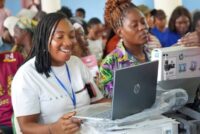 Beneficiaries with their brand new laptops